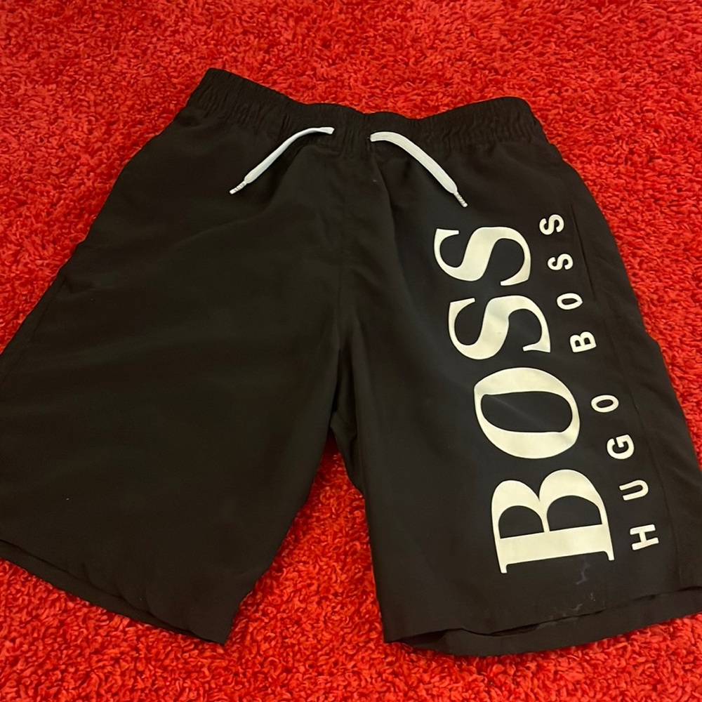 kids size 16 hugo boss swimming trunks.